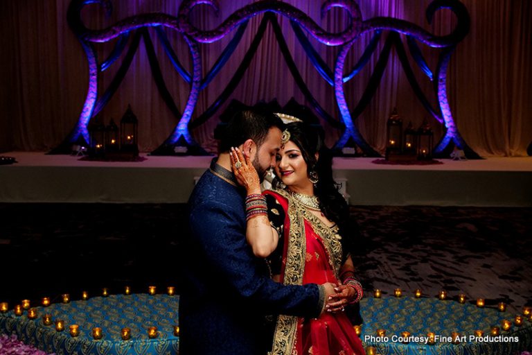 Indian Bride and Groom posing at the Sangeet