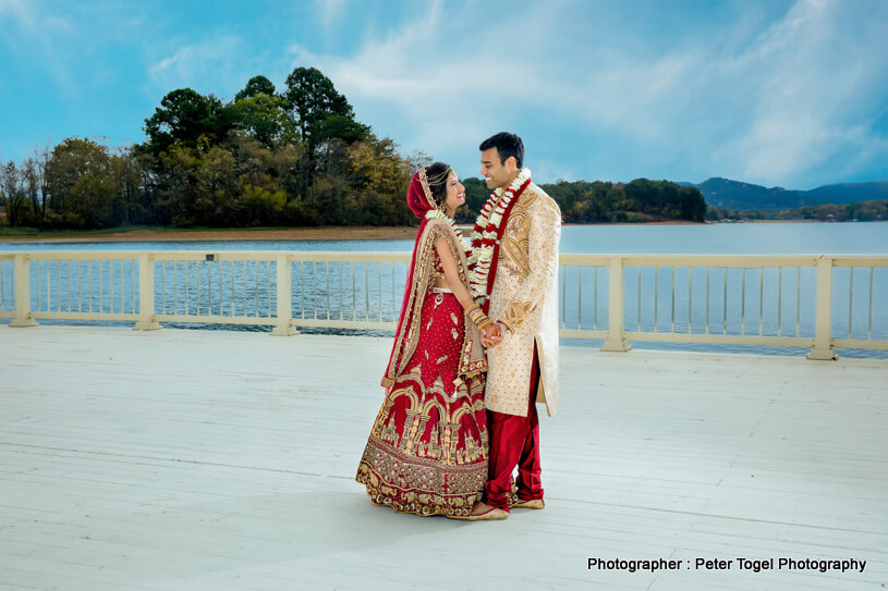 Indian bride and groom looking stunning