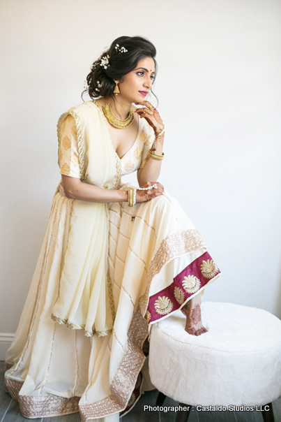 Bride with Mehndi in hands and foot
