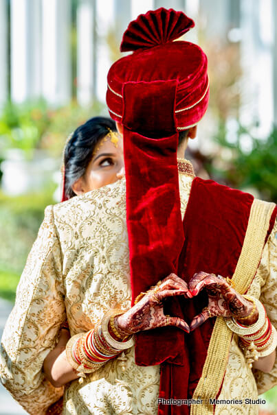Indian bride and groom romantic first glance.