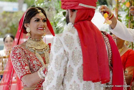 Indian bride and groom looking heavenly