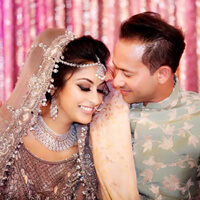 Indian groom admiring bride