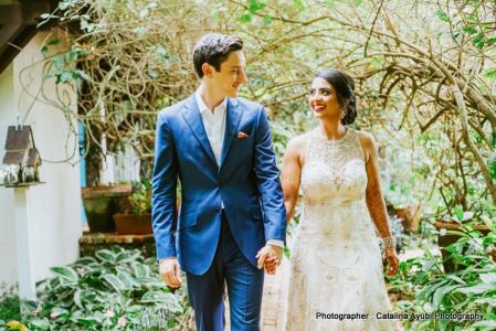 Lovely Indian  couple holding hands.