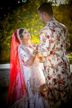 Glamorous indian couple looking at each other