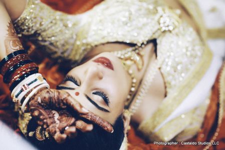 Beautiful bride with mehndi in her hands