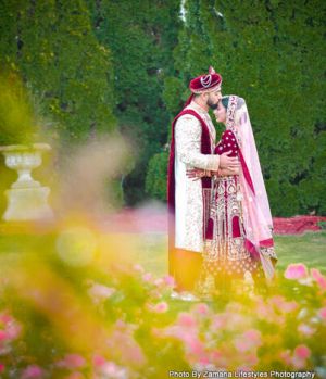 Indian bride and groom's romantic first look moment.