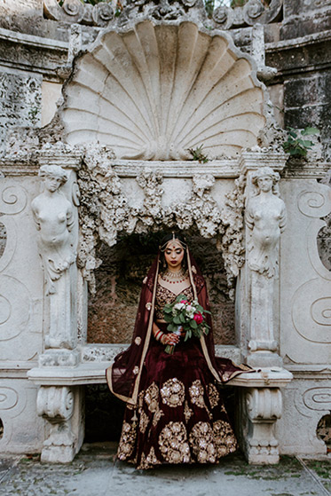 Indian Bride with Wedding Flower bouquet