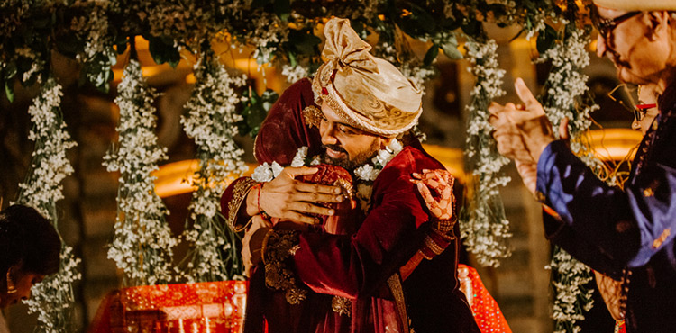 Indian Bride and Groom Hugging Eachother