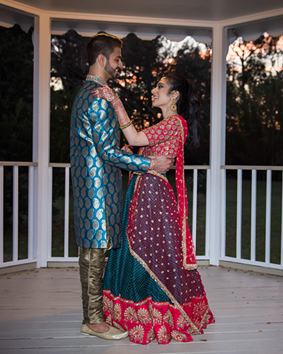 Romantic Indian Bride and Groom Looking to Each Other