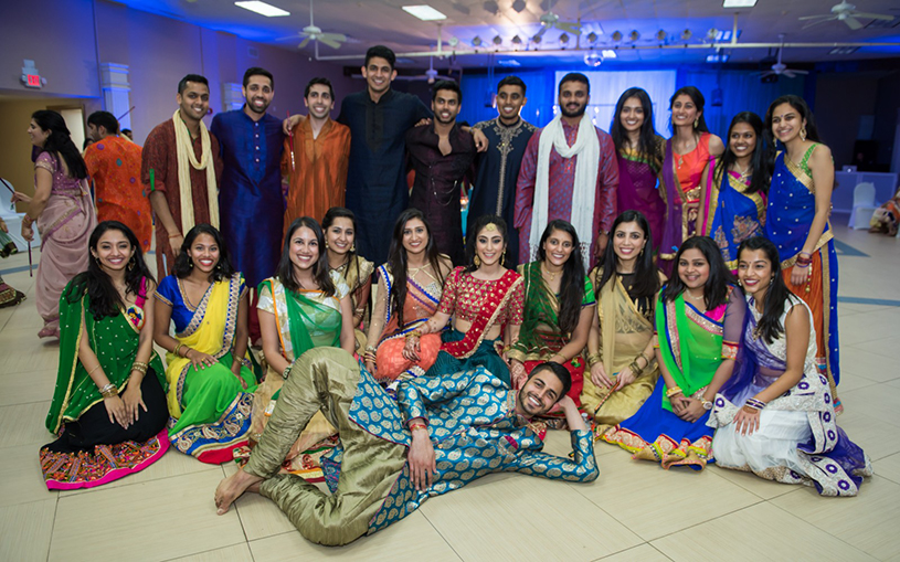 Indian Bride and Groom With Cousing and Friends at Sangeet Ceremony