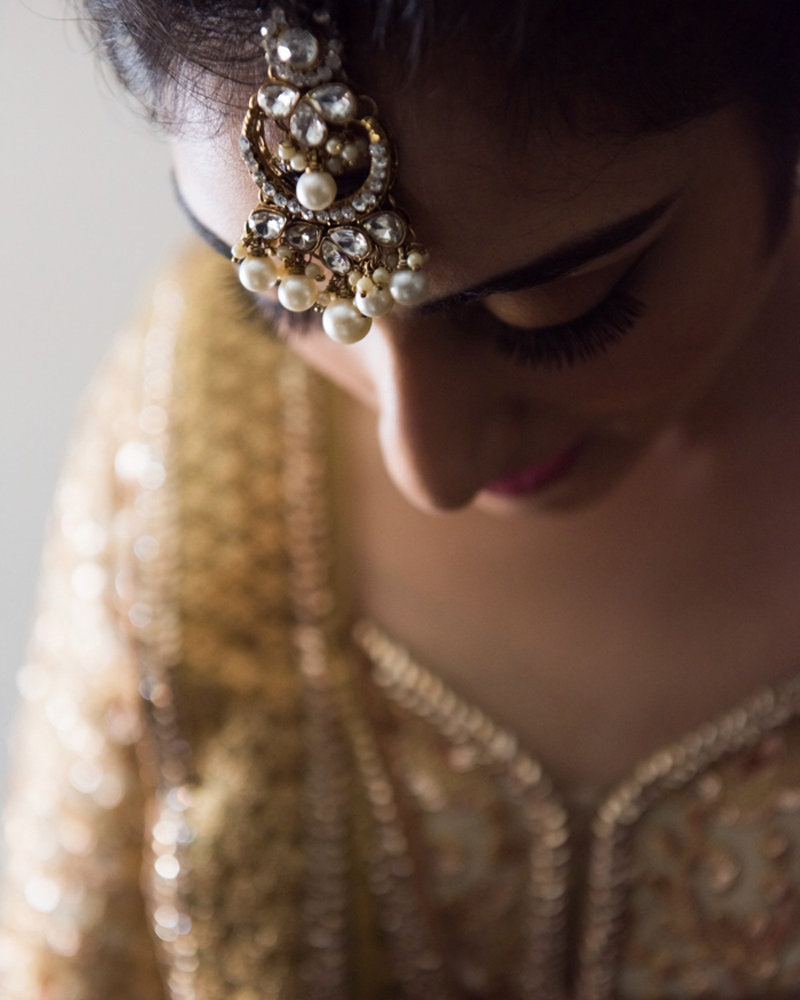 Shy Indian Bride Showing her Maangtikka