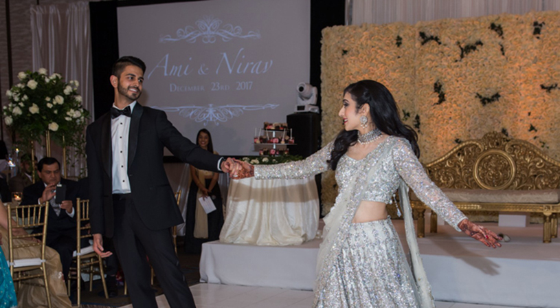 Indian couple Holding Hands and Looking to Each Other