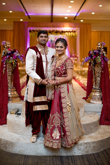 Radiant Indian Couple Holding Hands of Each Other