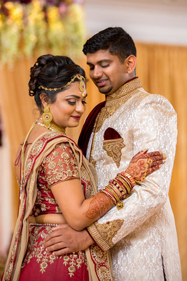 Indian Bride and Groom Hugging Eachother