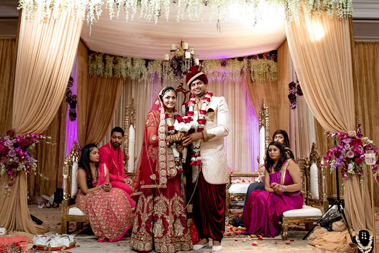 Gorgeous Indian Bride and Groom under Wedding Mandap