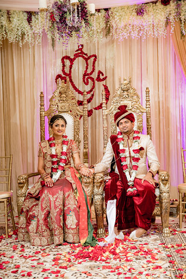 Indian Bride and Groom holding hands at their Wedding Ceremony