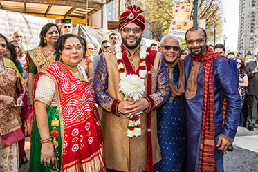 Indian Groom with Family Capture at Baraat Procession
