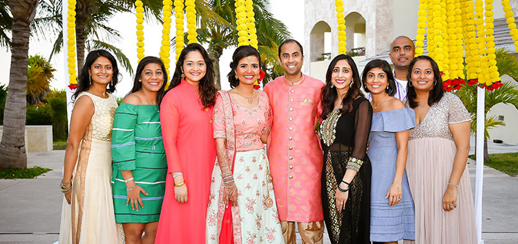 Adorable Indian bride posing with family