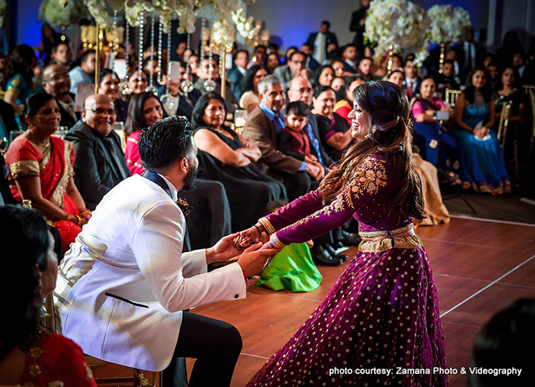 Indian Bride and Groom Performing Choreography During the Reception