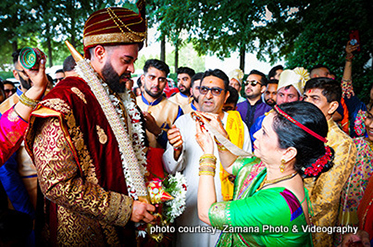 Indian Bride's Mother Welcoming Indian Groom