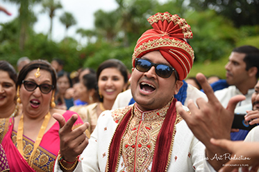 Indian Groom dancing in the baraat