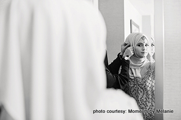 Family Member helping Bride to get ready for the ceremony