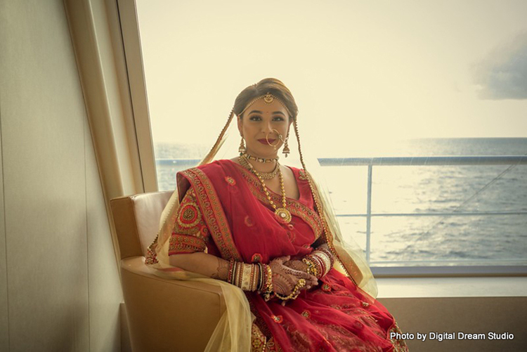 Gorgeous Indian bride with her wedding lehenga