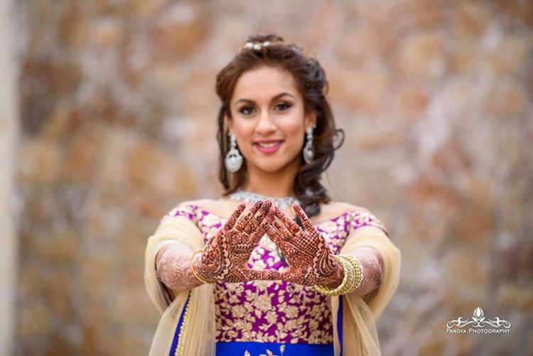 Indian Bride Showing her Mahendi 