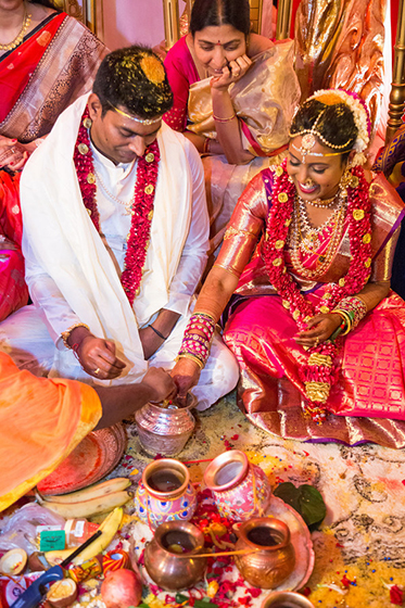 Indian South Asian Wedding Performing Ritual With Priest