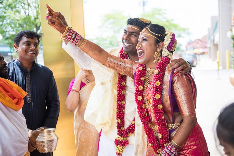 Indian Bride and Groom Performing their Wedding Procession