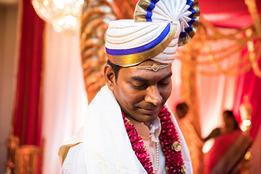 Indian Groom Wearing Turban and Garland