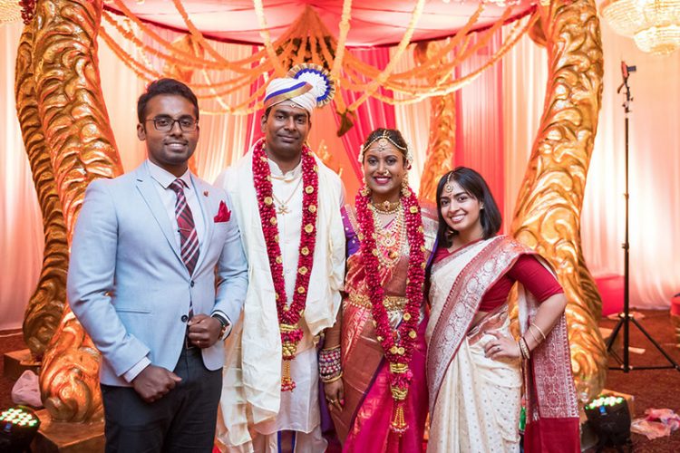 Indian Bride and Groom with their Family Friends