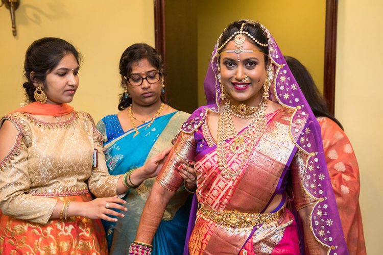 Bridesmaids Help Indian Bride for Getting Ready