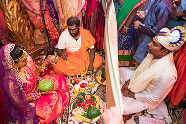 One Curtain Passing Throw Between Indian Bride and Groom