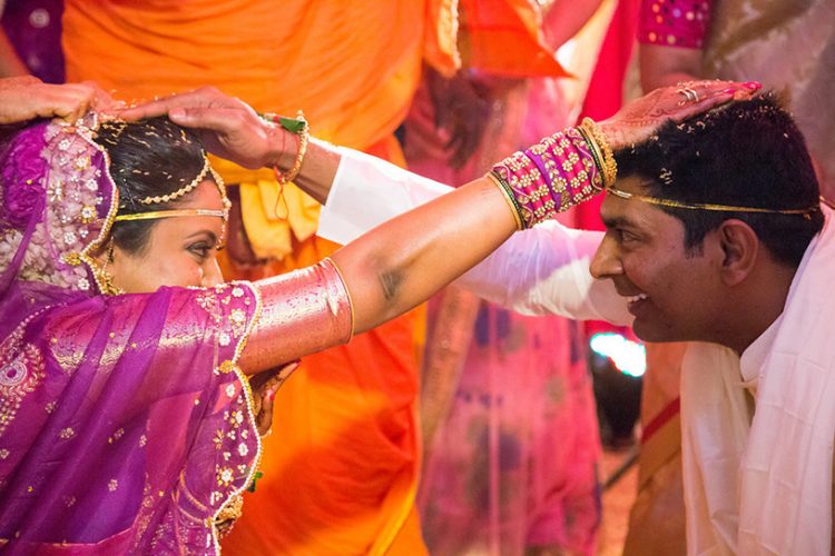 Indian Bride and Groom Giving Blessing to Each Other