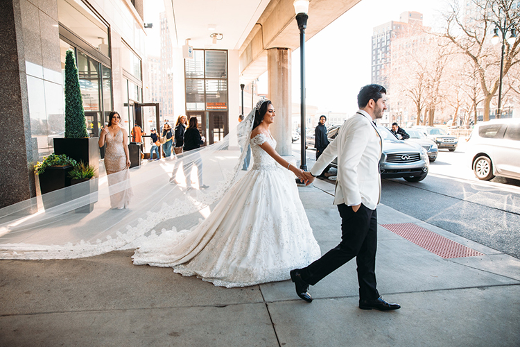 Indian Bride and Groom walking to their Car