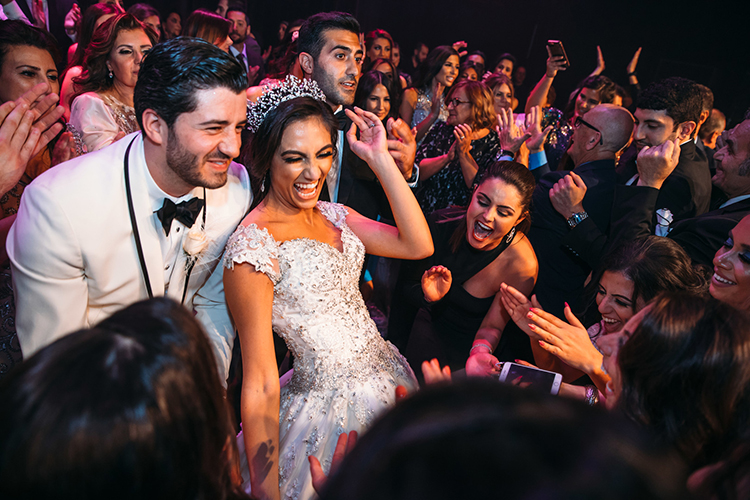 Birde and Groom Dancing with Their Guest