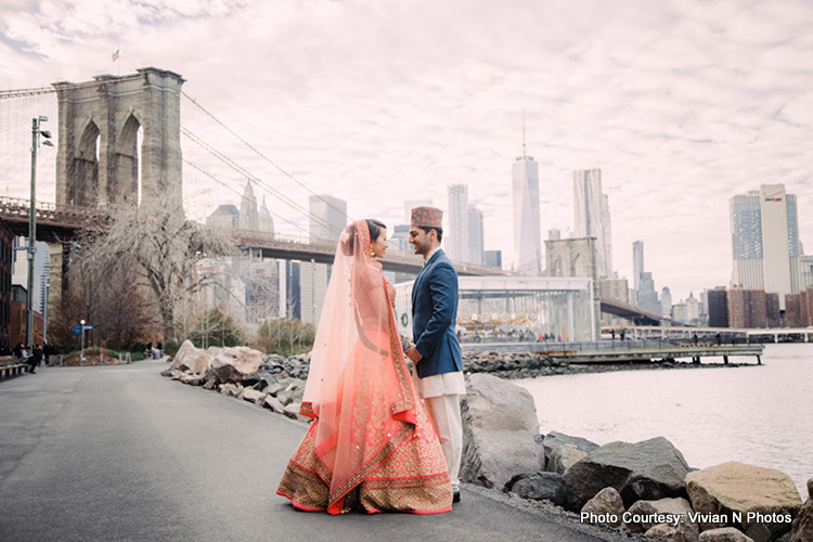 Indian bride and groom looking to each other with love