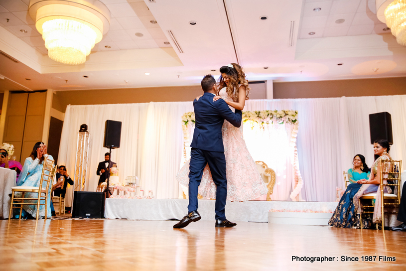 Indian Groom Holding Bride in hands