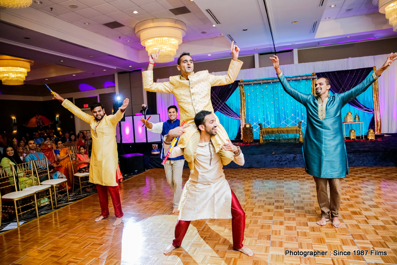 Indian Groom dancing with Groomsmaids