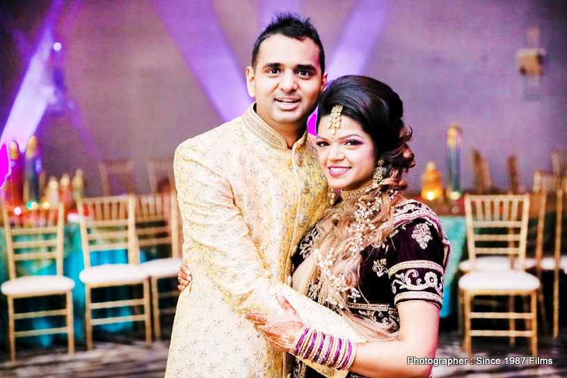 Indian Bride and groom smiling during photoshoot