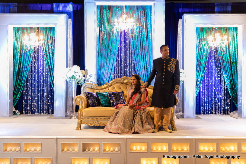 Dazzling Indian Bride showing her mehendi