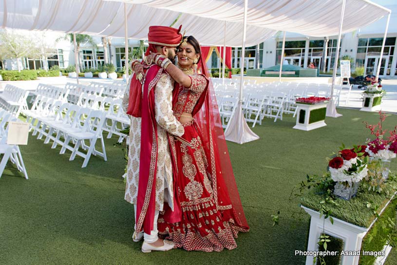 Indian Bride and Groom Hugging to each other capture