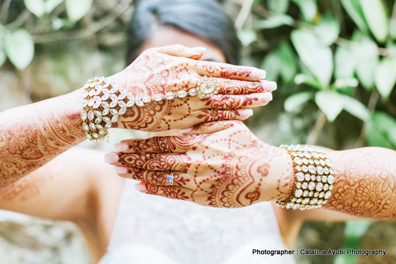 Indian Bride showing her Mahendi Design