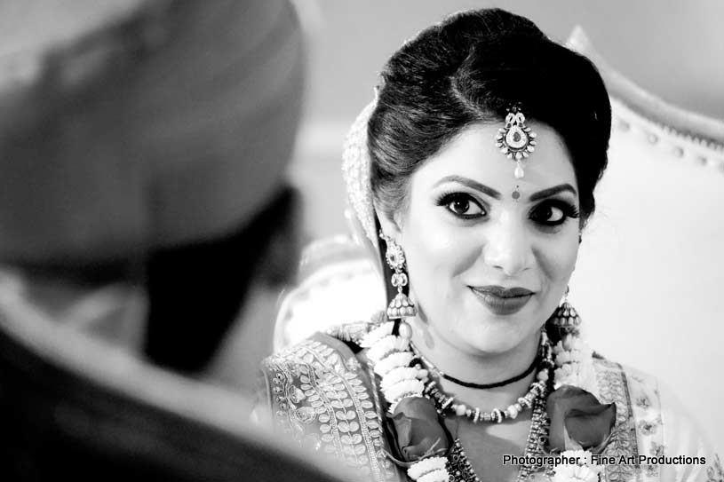 Indian Bride looking at the Groom