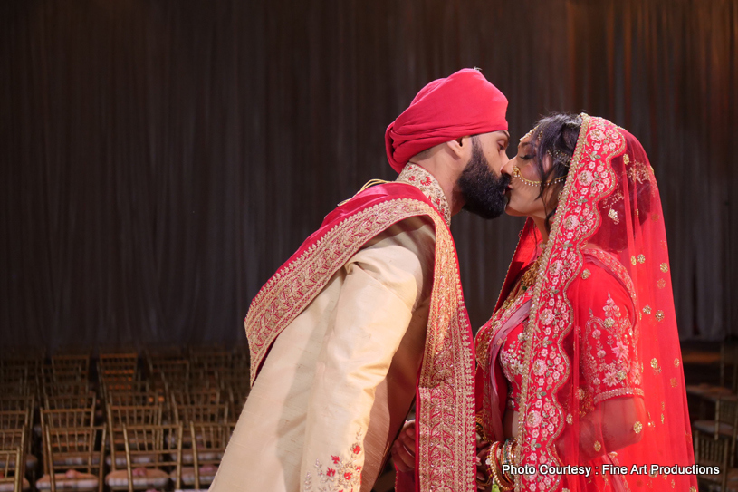 Indian Couple kissing after the ceremony
