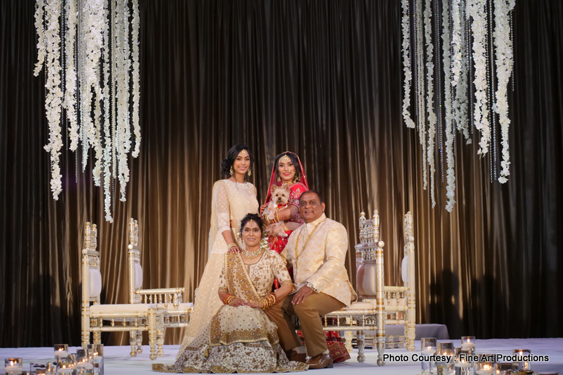 Indian Bride with Family posing for a photo