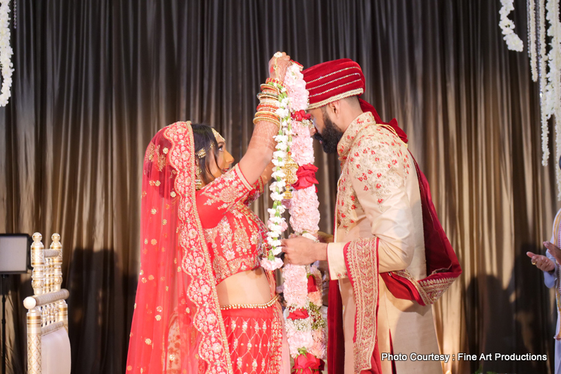 Bride exchanging Garland 