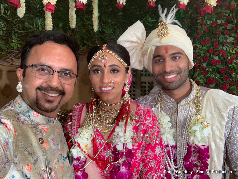 Indian Newly Weds posing with the Friend