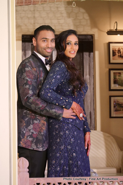 Indian Couple posing before the sangeet ceremony